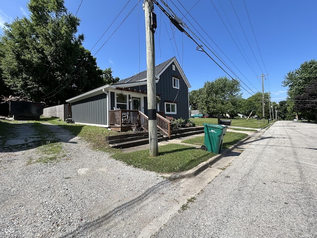 315 W N St, Crawfordsville, IN 47933 - view of front of home with board and batten siding and driveway