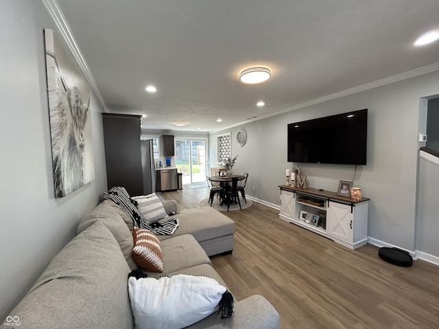 315 W N St, Crawfordsville, IN 47933 - living area featuring crown molding, wood finished floors, and recessed lighting