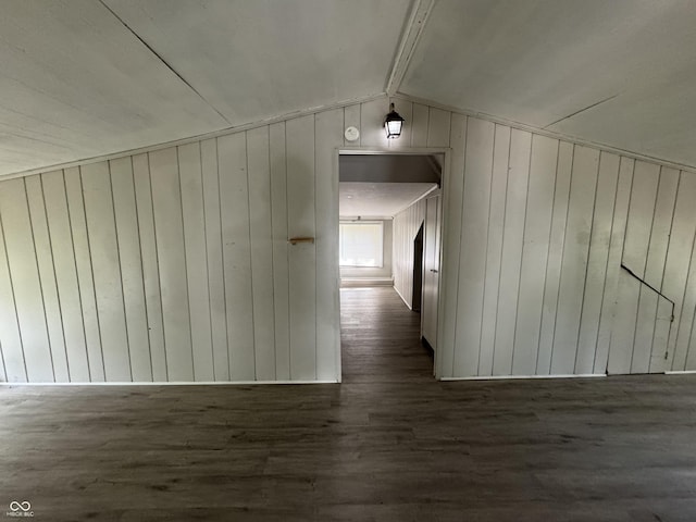 2002 N Audubon Rd, Indianapolis, IN 46218 - corridor with dark wood-style floors, lofted ceiling, and wooden walls
