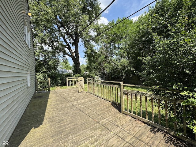 2002 N Audubon Rd, Indianapolis, IN 46218 - wooden terrace featuring view of scattered trees