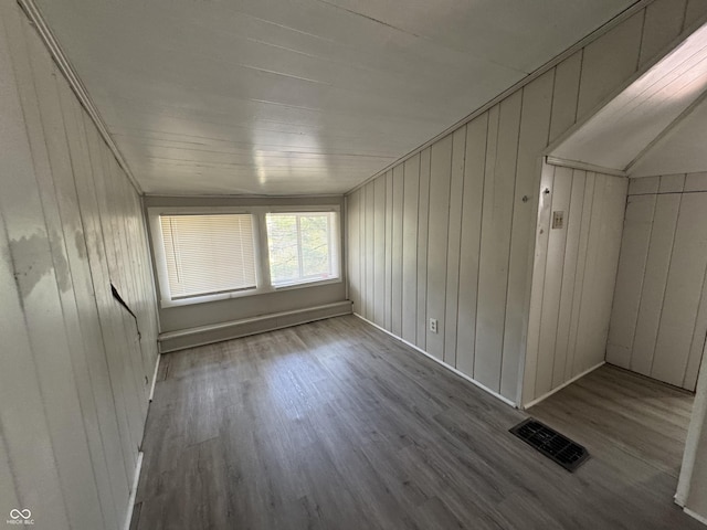 2002 N Audubon Rd, Indianapolis, IN 46218 - spare room with wood finished floors and wooden walls