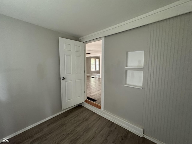 2002 N Audubon Rd, Indianapolis, IN 46218 - spare room featuring dark wood-style flooring