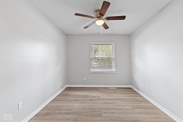 3102 Pawnee Dr, Indianapolis, IN 46235 - unfurnished room with a ceiling fan and light wood finished floors