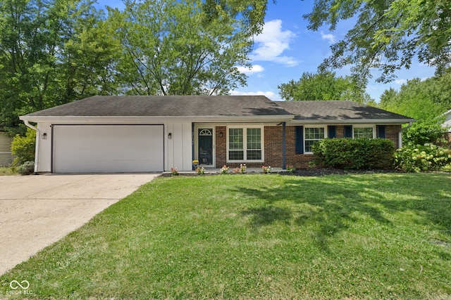 3102 Pawnee Dr, Indianapolis, IN 46235 - ranch-style home with concrete driveway, an attached garage, a front yard, brick siding, and board and batten siding