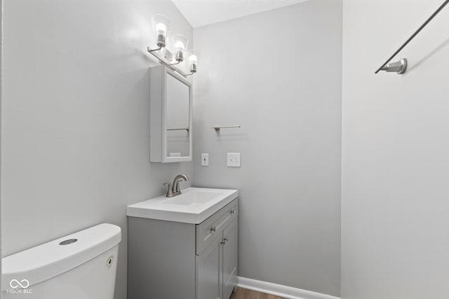 3102 Pawnee Dr, Indianapolis, IN 46235 - bathroom featuring vanity and wood finished floors