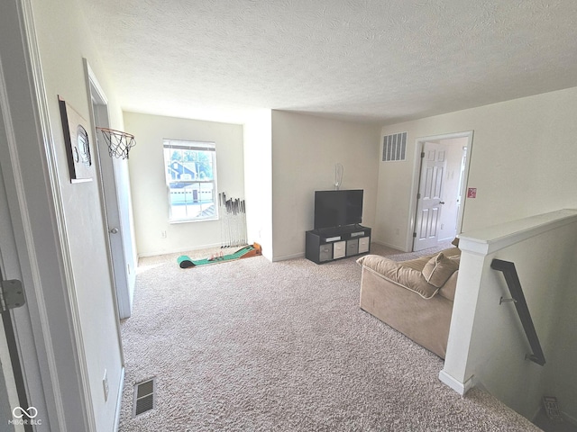 7626 Merrick Dr, Brownsburg, IN 46112 - carpeted living room with a textured ceiling