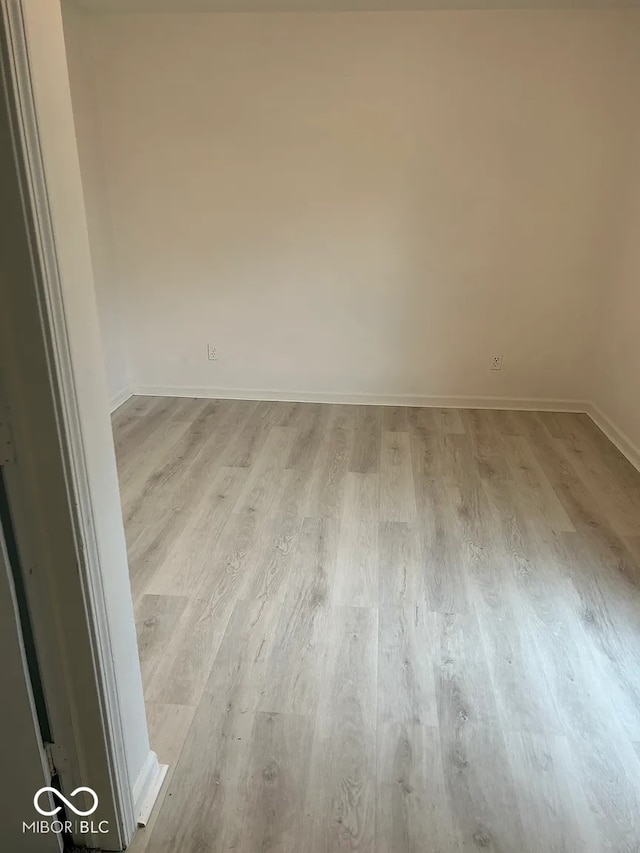7589 S 100 W, Wabash, IN 46992 - spare room with wood finished floors and baseboards