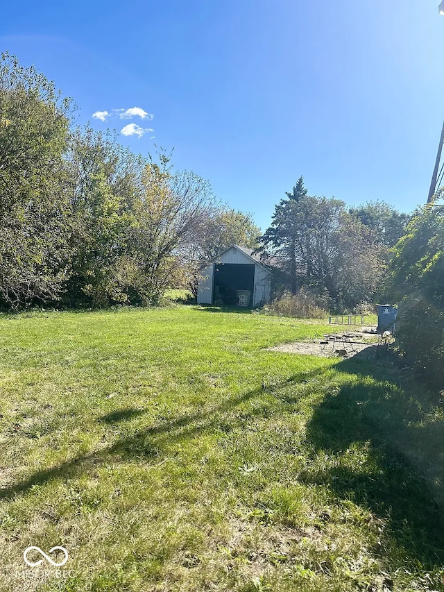 7589 S 100 W, Wabash, IN 46992 - view of green lawn with a pole building, an outbuilding, and a rural view