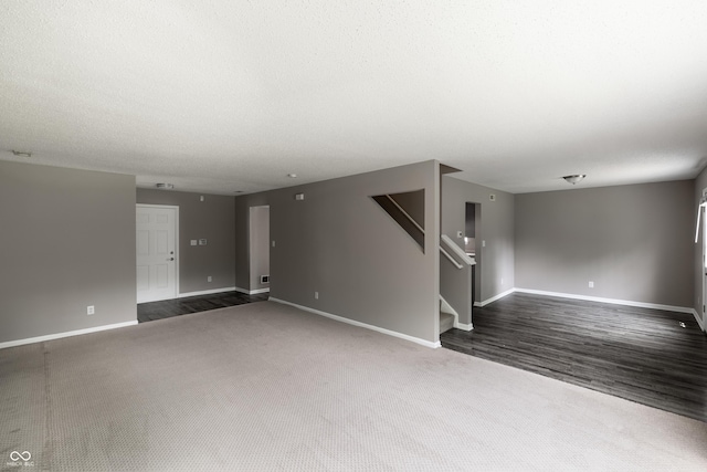 3307 Blue Ash, Indianapolis, IN 46239 - unfurnished living room featuring stairway and dark colored carpet