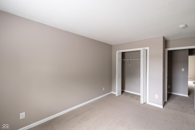 3307 Blue Ash, Indianapolis, IN 46239 - unfurnished bedroom featuring carpet, a closet, and a textured ceiling