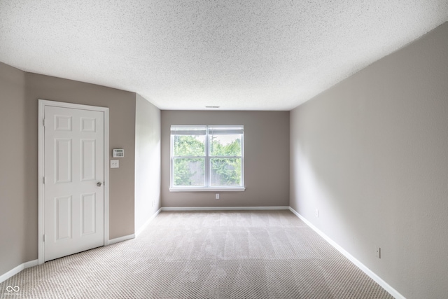3307 Blue Ash, Indianapolis, IN 46239 - empty room featuring carpet floors and a textured ceiling