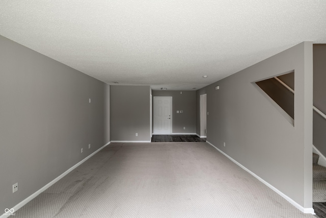 3307 Blue Ash, Indianapolis, IN 46239 - carpeted empty room with a textured ceiling and stairs
