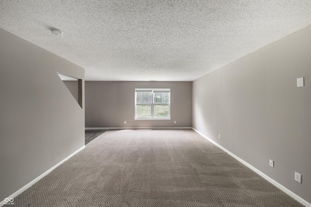 3307 Blue Ash, Indianapolis, IN 46239 - unfurnished room featuring carpet, a smoke detector, and a textured ceiling