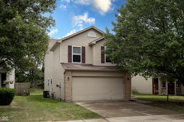 3307 Blue Ash, Indianapolis, IN 46239 - view of front of house with a garage, driveway, a front yard, and brick siding