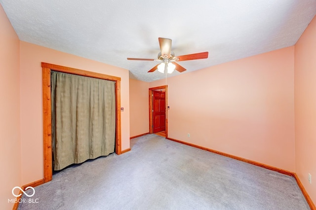8910 Richarts Rd, Morgantown, IN 46160 - unfurnished bedroom with carpet flooring, a closet, and ceiling fan