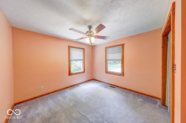 8910 Richarts Rd, Morgantown, IN 46160 - carpeted spare room with a ceiling fan and a textured ceiling