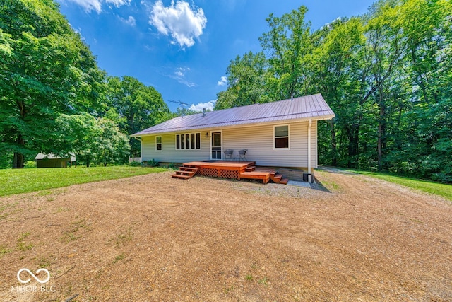 8910 Richarts Rd, Morgantown, IN 46160 - back of house with a metal roof and a deck