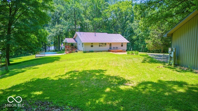 8910 Richarts Rd, Morgantown, IN 46160 - view of green lawn with a deck