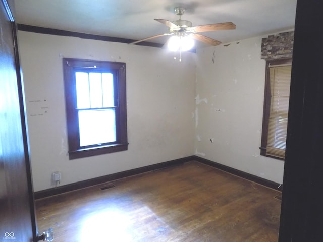 940 N Grant Ave, Indianapolis, IN 46201 - empty room featuring wood finished floors and a ceiling fan