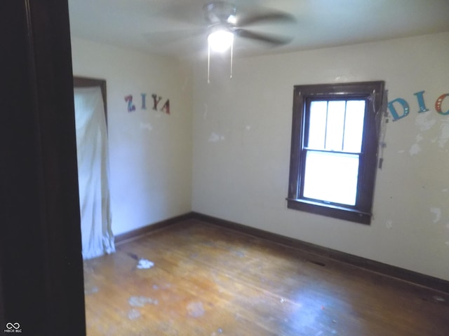 940 N Grant Ave, Indianapolis, IN 46201 - spare room with wood finished floors and ceiling fan