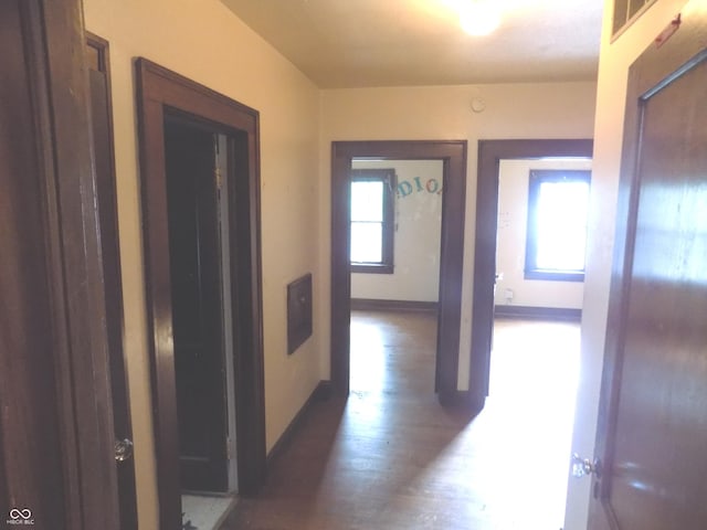 940 N Grant Ave, Indianapolis, IN 46201 - hall with wood finished floors and baseboards