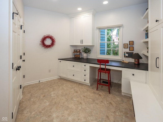 8708 Highwood Ln, Indianapolis, IN 46278 - home office featuring built in study area, recessed lighting, and light flooring