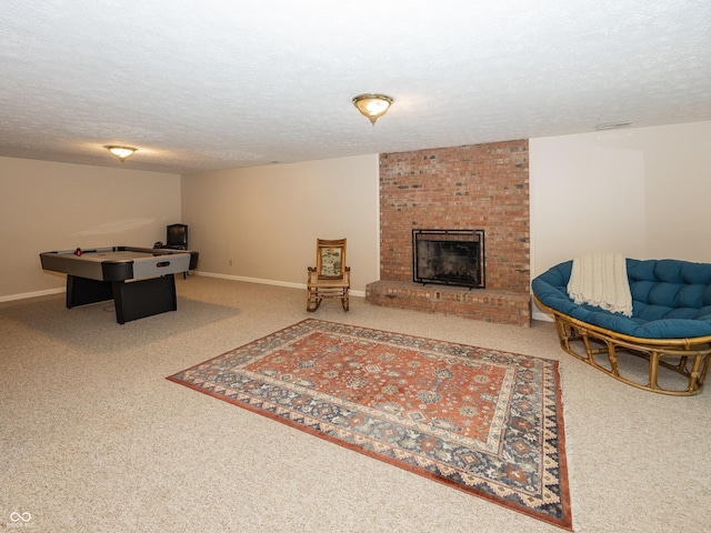 8708 Highwood Ln, Indianapolis, IN 46278 - living area featuring carpet, a textured ceiling, and a brick fireplace