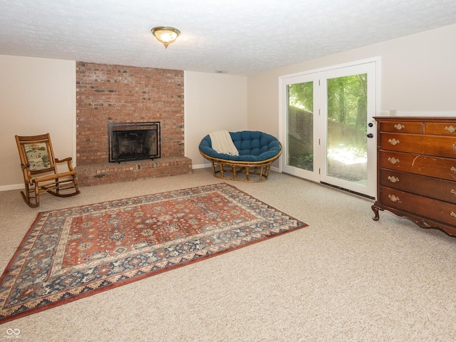 8708 Highwood Ln, Indianapolis, IN 46278 - living room featuring carpet, a textured ceiling, and a brick fireplace
