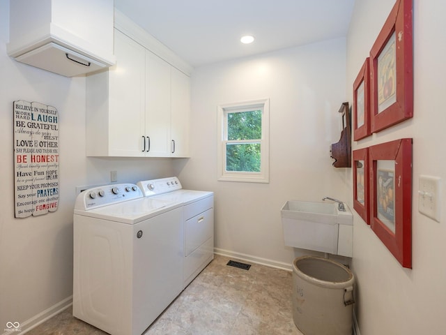 8708 Highwood Ln, Indianapolis, IN 46278 - laundry area with washing machine and clothes dryer, cabinet space, and recessed lighting