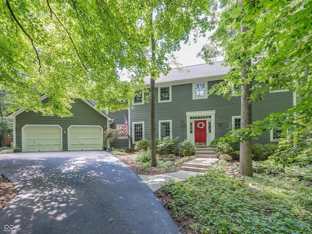 8708 Highwood Ln, Indianapolis, IN 46278 - colonial-style house with a garage