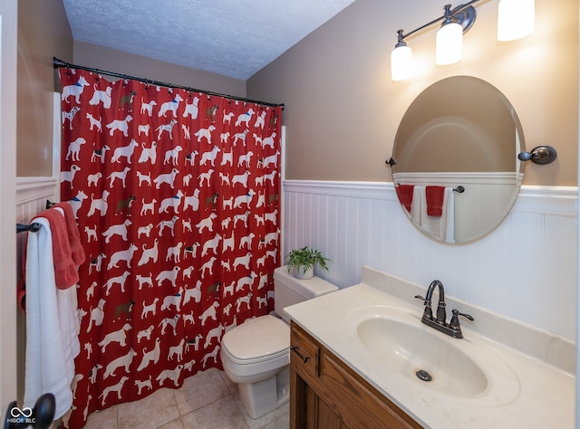 8708 Highwood Ln, Indianapolis, IN 46278 - bathroom with a wainscoted wall, vanity, tile patterned flooring, curtained shower, and a decorative wall