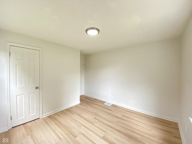 4002 E Pleasant Run Parkway N Drive, Indianapolis, IN 46201 - unfurnished room featuring light wood finished floors and baseboards