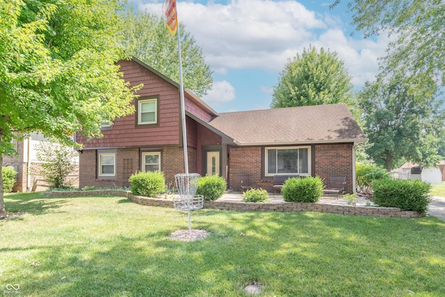 5237 Honey Comb Ln, Indianapolis, IN 46221 - split level home featuring brick siding and a front lawn