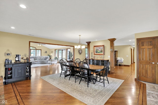 5238 N 225 E, Whiteland, IN 46184 - dining room with wood finished floors, recessed lighting, a chandelier, lofted ceiling, and decorative columns