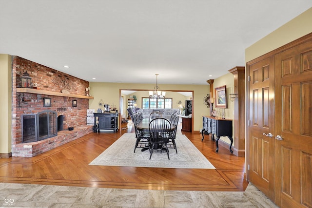 5238 N 225 E, Whiteland, IN 46184 - dining room featuring a chandelier, a brick fireplace, wood finished floors, and recessed lighting