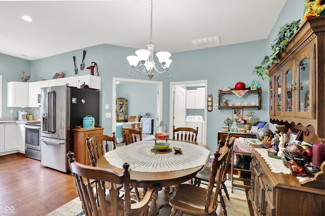5238 N 225 E, Whiteland, IN 46184 - dining area with light wood-type flooring, washer / clothes dryer, a chandelier, and recessed lighting