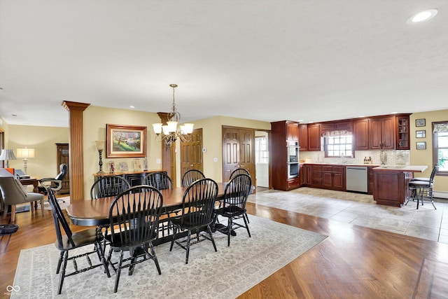 5238 N 225 E, Whiteland, IN 46184 - dining room featuring a chandelier, recessed lighting, light wood finished floors, and decorative columns