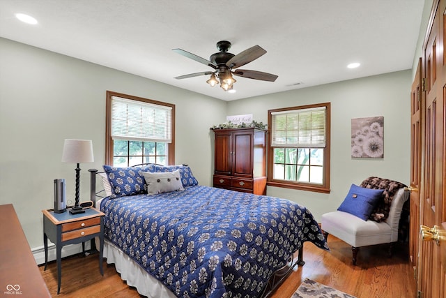 5238 N 225 E, Whiteland, IN 46184 - bedroom with wood finished floors, recessed lighting, and a ceiling fan