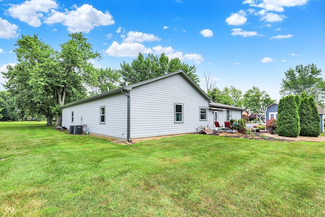 5238 N 225 E, Whiteland, IN 46184 - back of property with a yard and a patio area