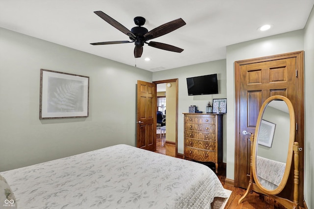 5238 N 225 E, Whiteland, IN 46184 - bedroom with wood finished floors, recessed lighting, and a ceiling fan