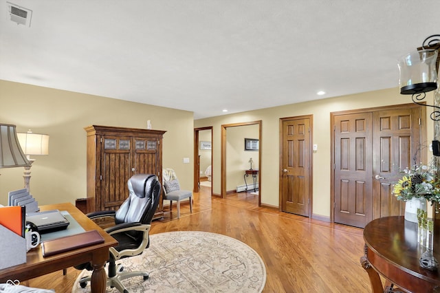 5238 N 225 E, Whiteland, IN 46184 - office featuring a baseboard heating unit, light wood-style flooring, and recessed lighting