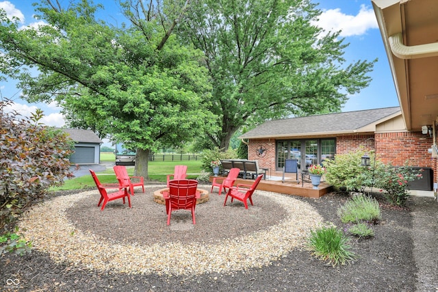 5238 N 225 E, Whiteland, IN 46184 - view of yard featuring an outdoor fire pit and a wooden deck
