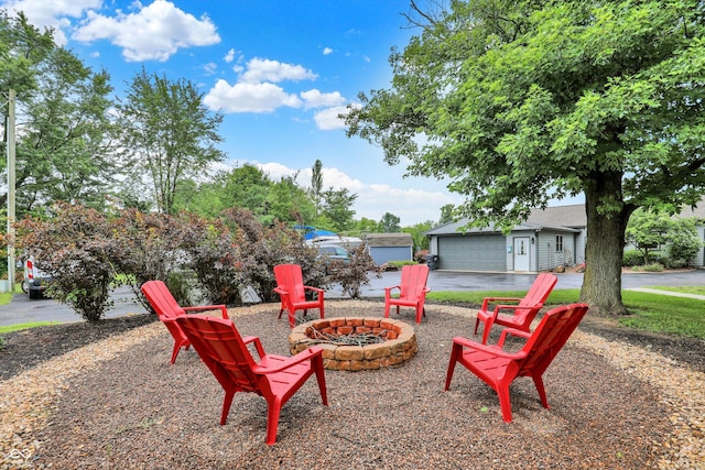 5238 N 225 E, Whiteland, IN 46184 - view of patio featuring an outdoor fire pit and a detached garage