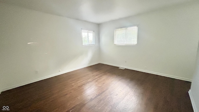 7231 S Franklin Rd, Indianapolis, IN 46259 - unfurnished room with dark wood-style flooring and baseboards