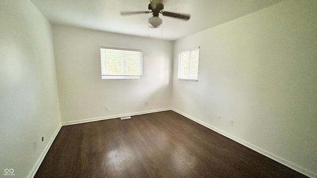 7231 S Franklin Rd, Indianapolis, IN 46259 - spare room featuring a ceiling fan and dark wood-style floors