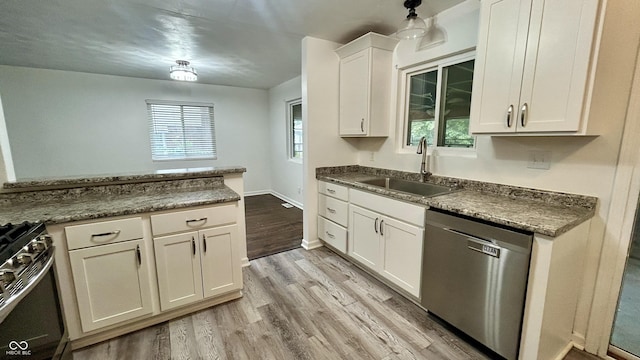 7231 S Franklin Rd, Indianapolis, IN 46259 - kitchen with appliances with stainless steel finishes, light wood-type flooring, white cabinets, and dark countertops