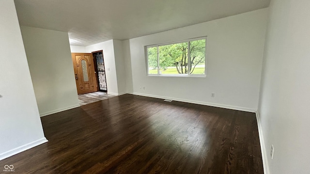 7231 S Franklin Rd, Indianapolis, IN 46259 - unfurnished room featuring dark wood-type flooring and baseboards