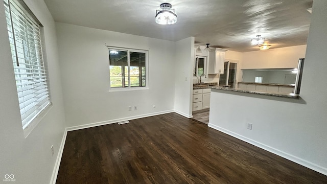7231 S Franklin Rd, Indianapolis, IN 46259 - kitchen with white cabinets and dark wood-type flooring