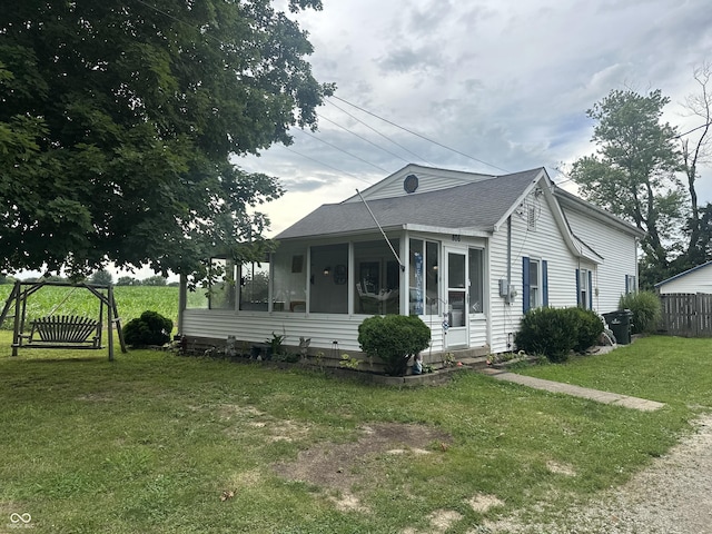 806 W Park Rd, Greensburg, IN 47240 - view of front facade with a sunroom and roof with shingles