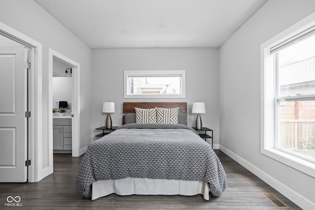 1935 Cornell Ave, Indianapolis, IN 46202 - bedroom featuring dark wood-style floors and ensuite bathroom
